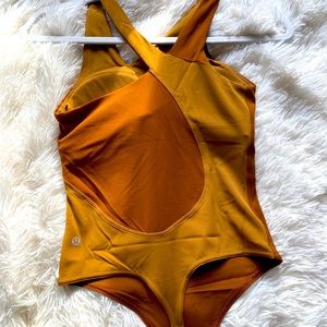 Lululemon Bodysuit SZ 4. Brand new never worn